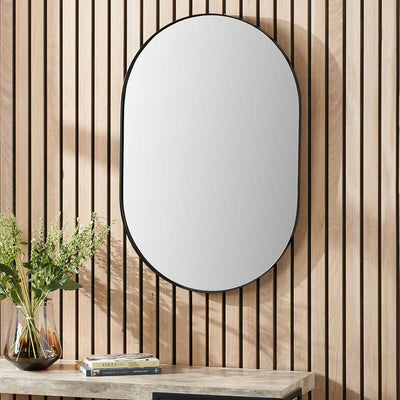 oval-mirror-bamboo-wall